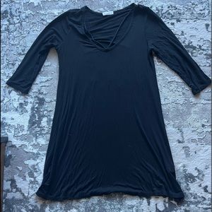 Very soft, 3/4 sleeve, black dress with cute accent on bust